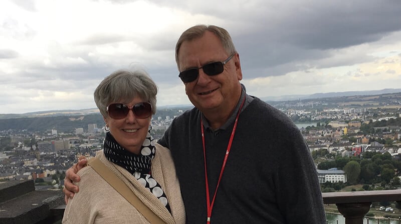 Ray With His Partner, Smiling for a Photo in the City