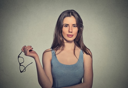 Young Woman with Glasses Considering LASIK