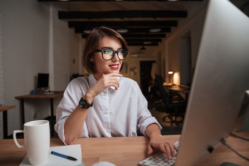 Woman checking computer